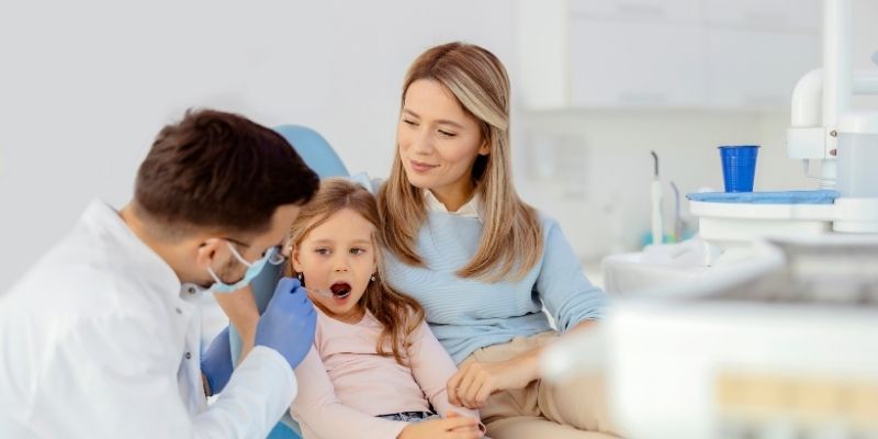 Kids dental emergency care near Ansal Essentia at Petal Smiles Dental Clinic