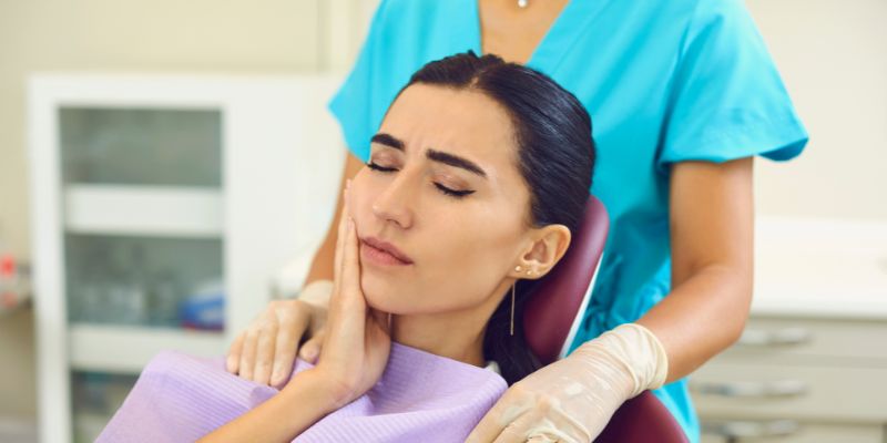 Sensitive teeth treatment near Badshahpur at Petal Smiles Dental Clinic.